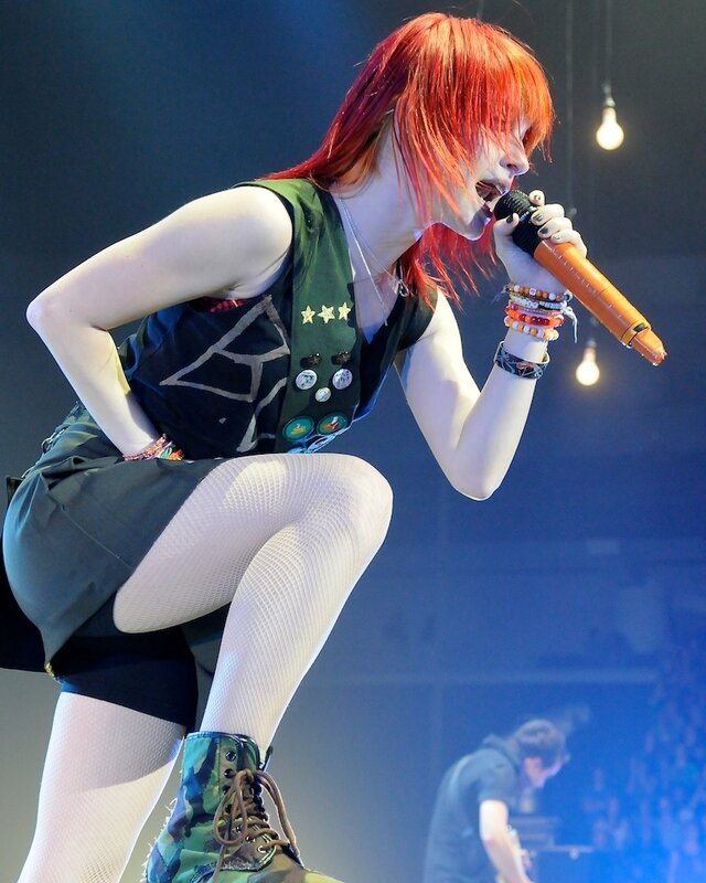 singer performing on stage