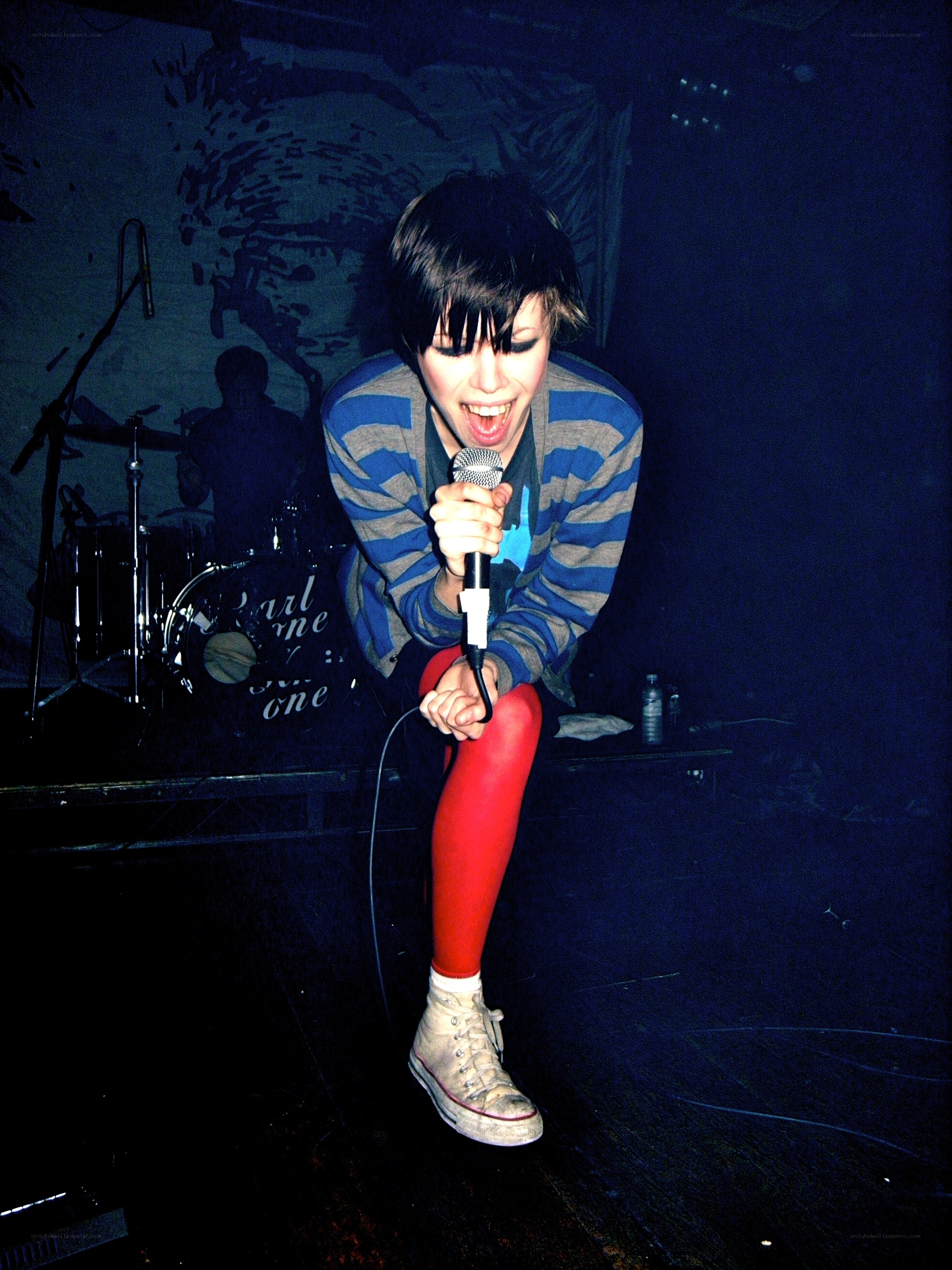 singer performing on stage