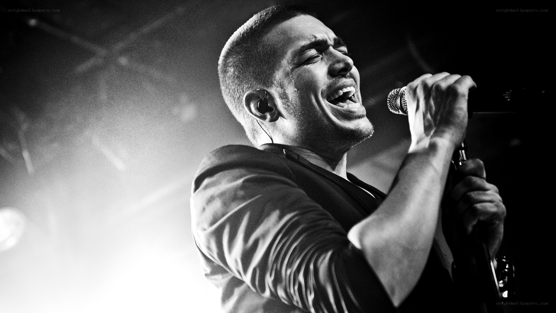 singer performing on stage