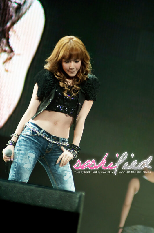 singer performing on stage