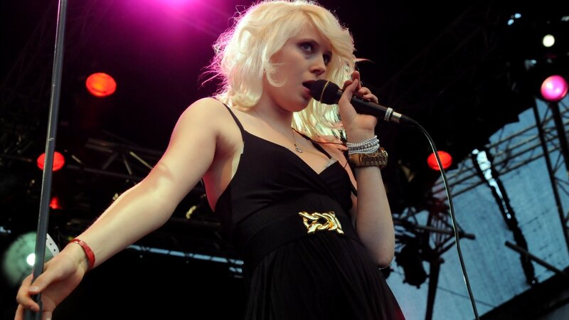 singer performing on stage