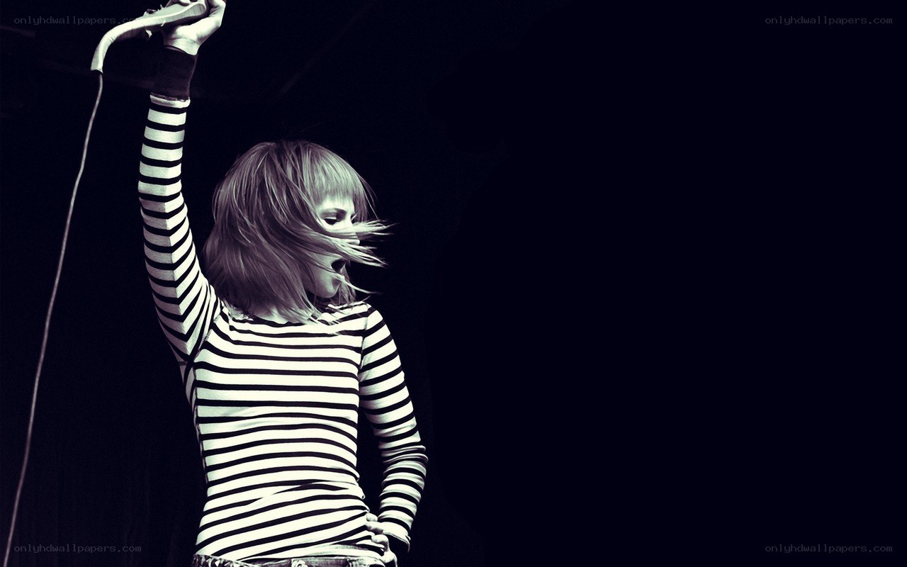 singer performing on stage