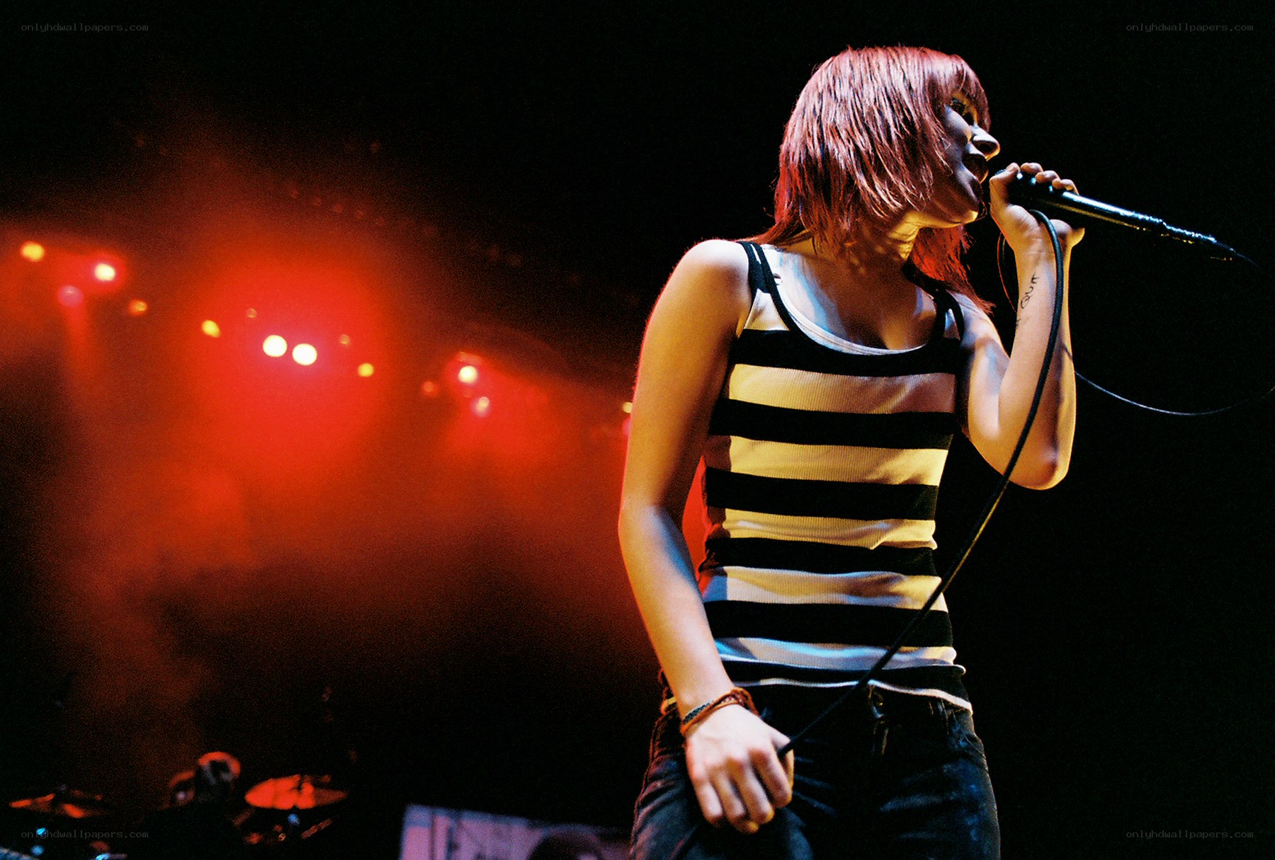 singer performing on stage