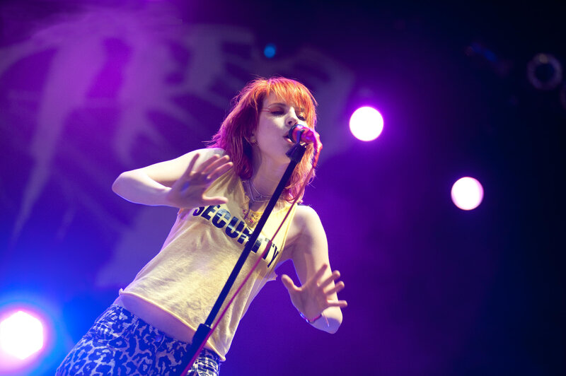 singer performing on stage