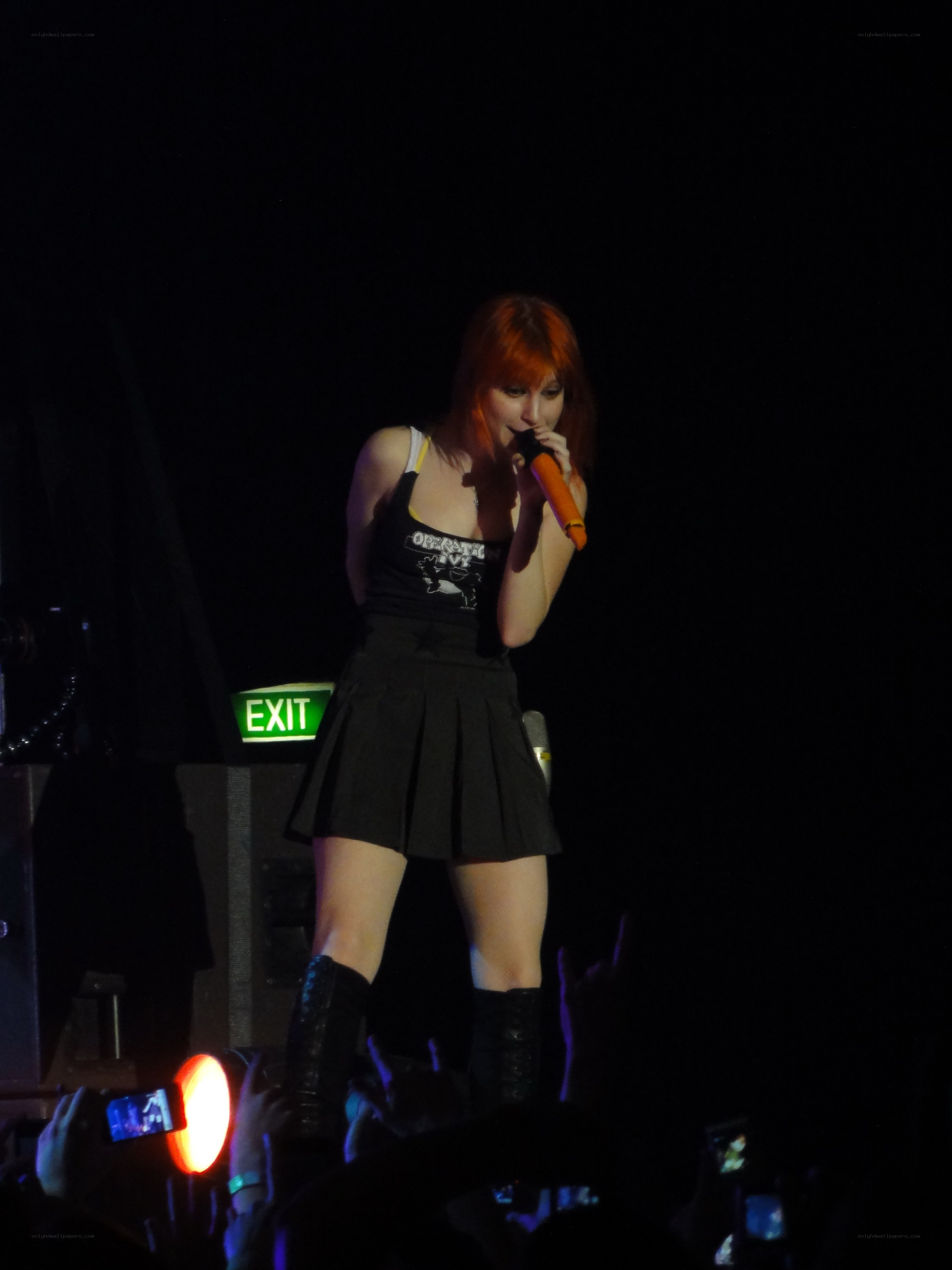 singer performing on stage