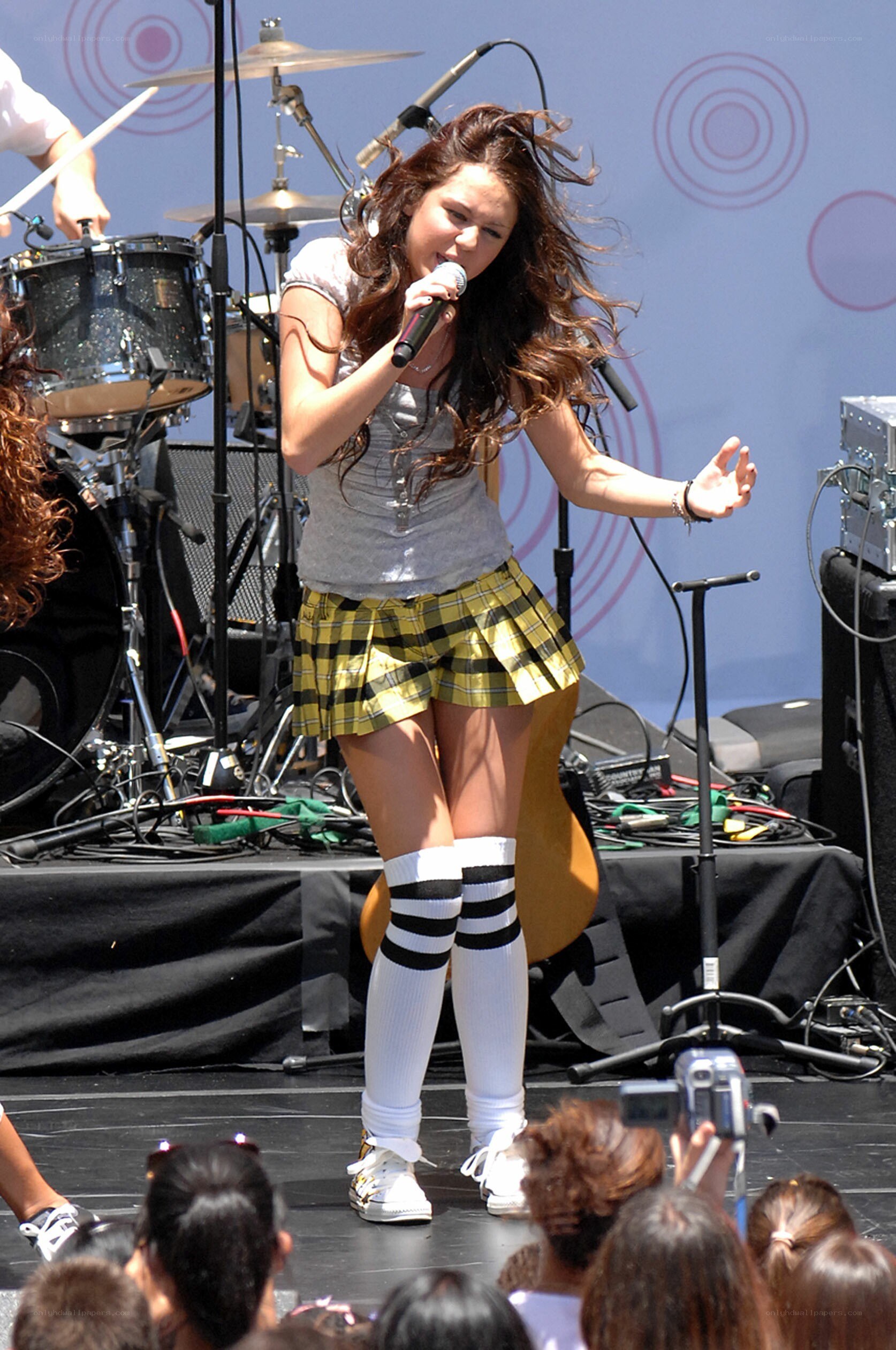 singer performing on stage