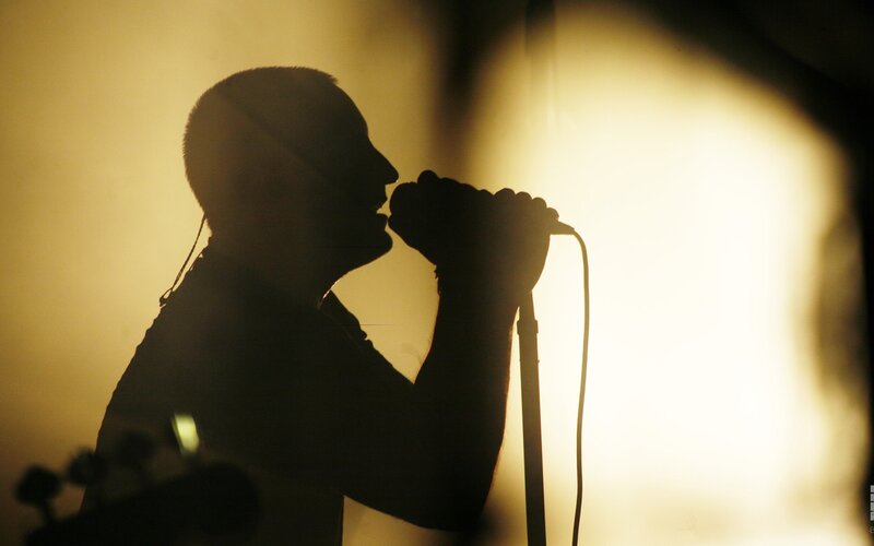 singer performing on stage