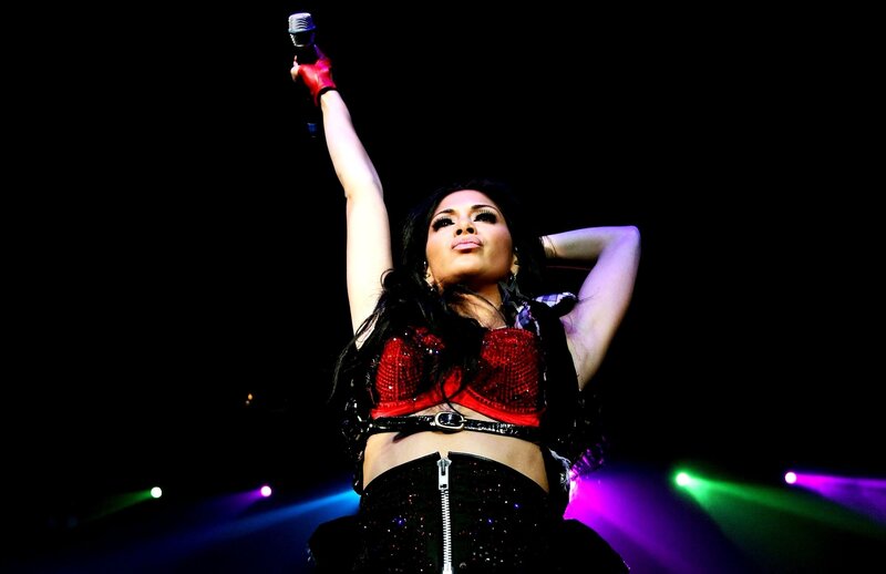 singer performing on stage