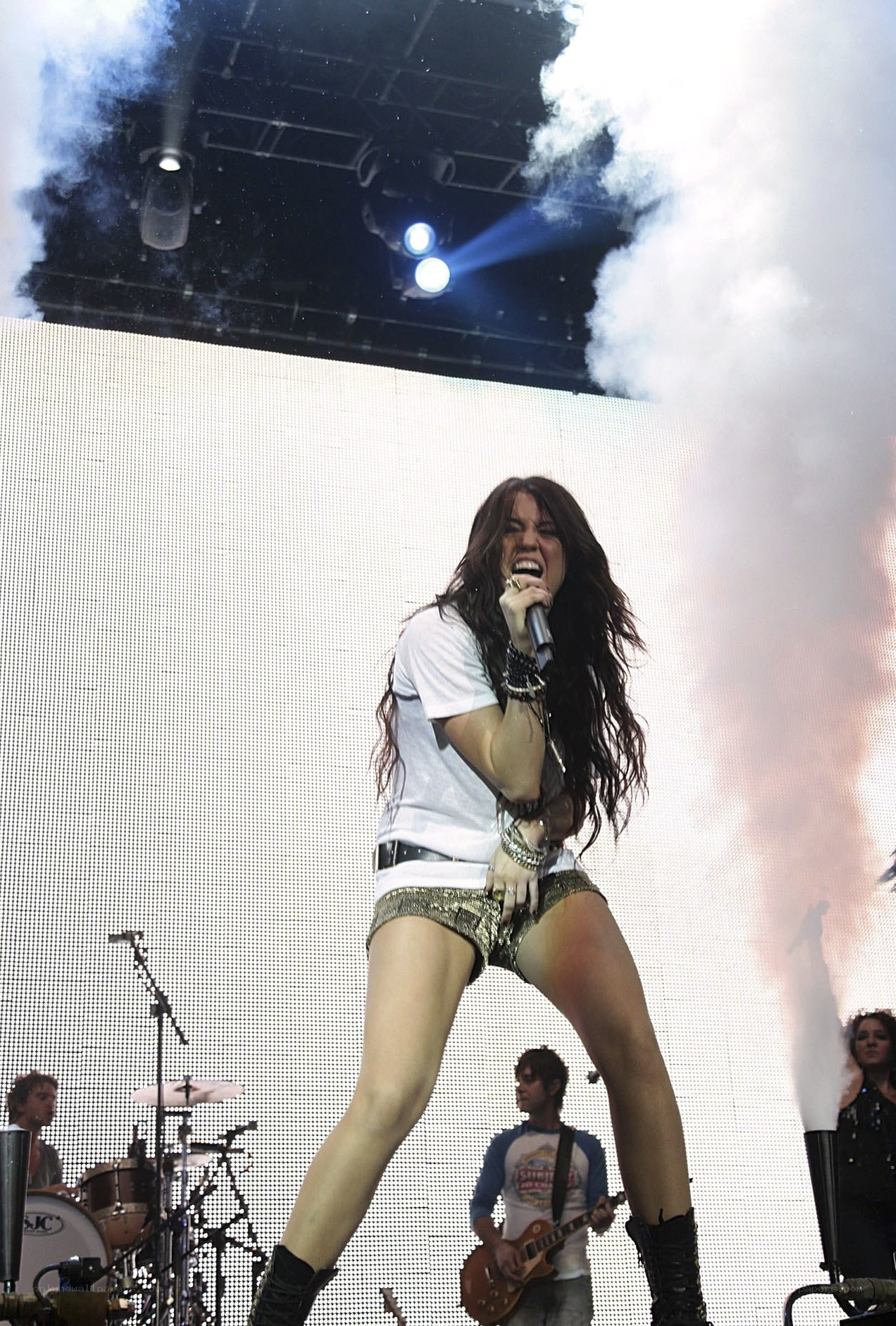 singer performing on stage