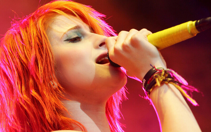 singer performing on stage