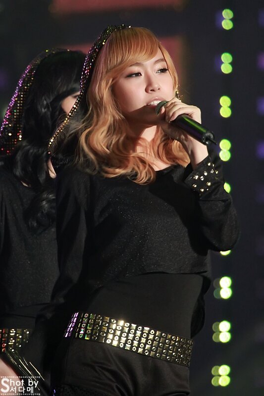 singer performing on stage