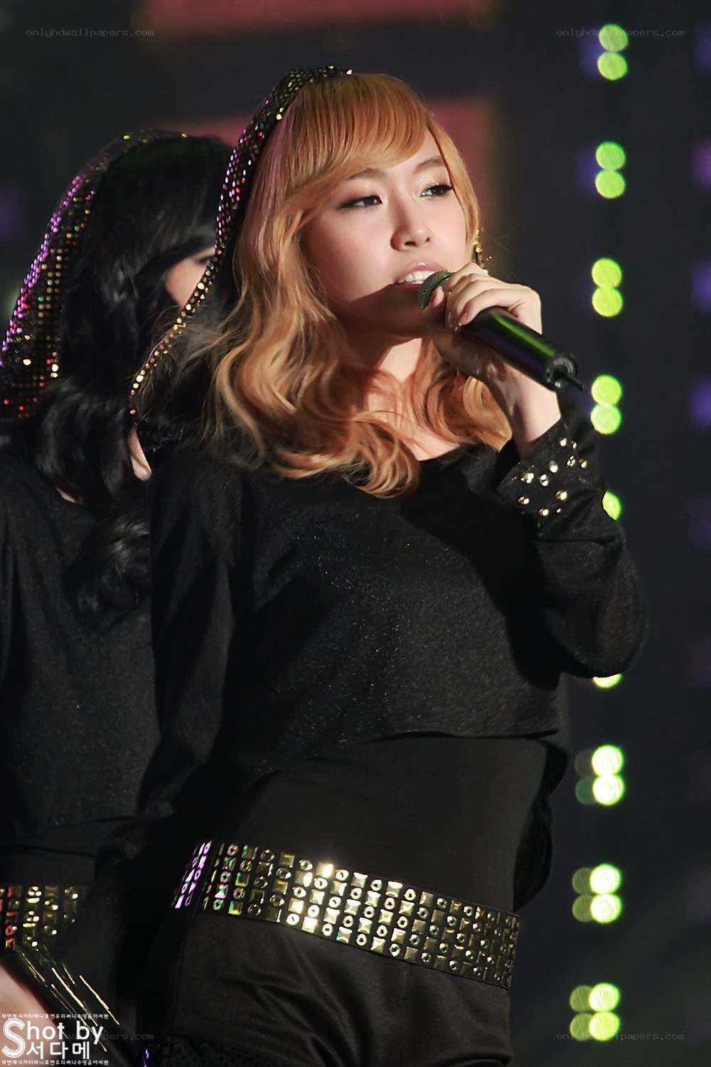 singer performing on stage