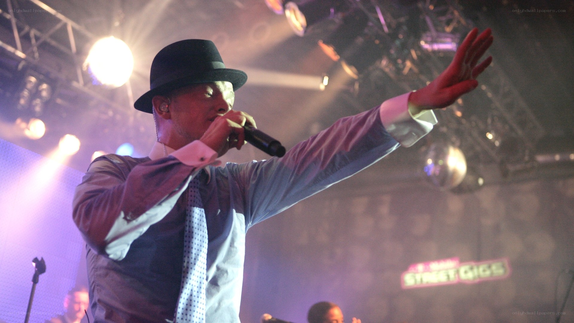 singer performing on stage
