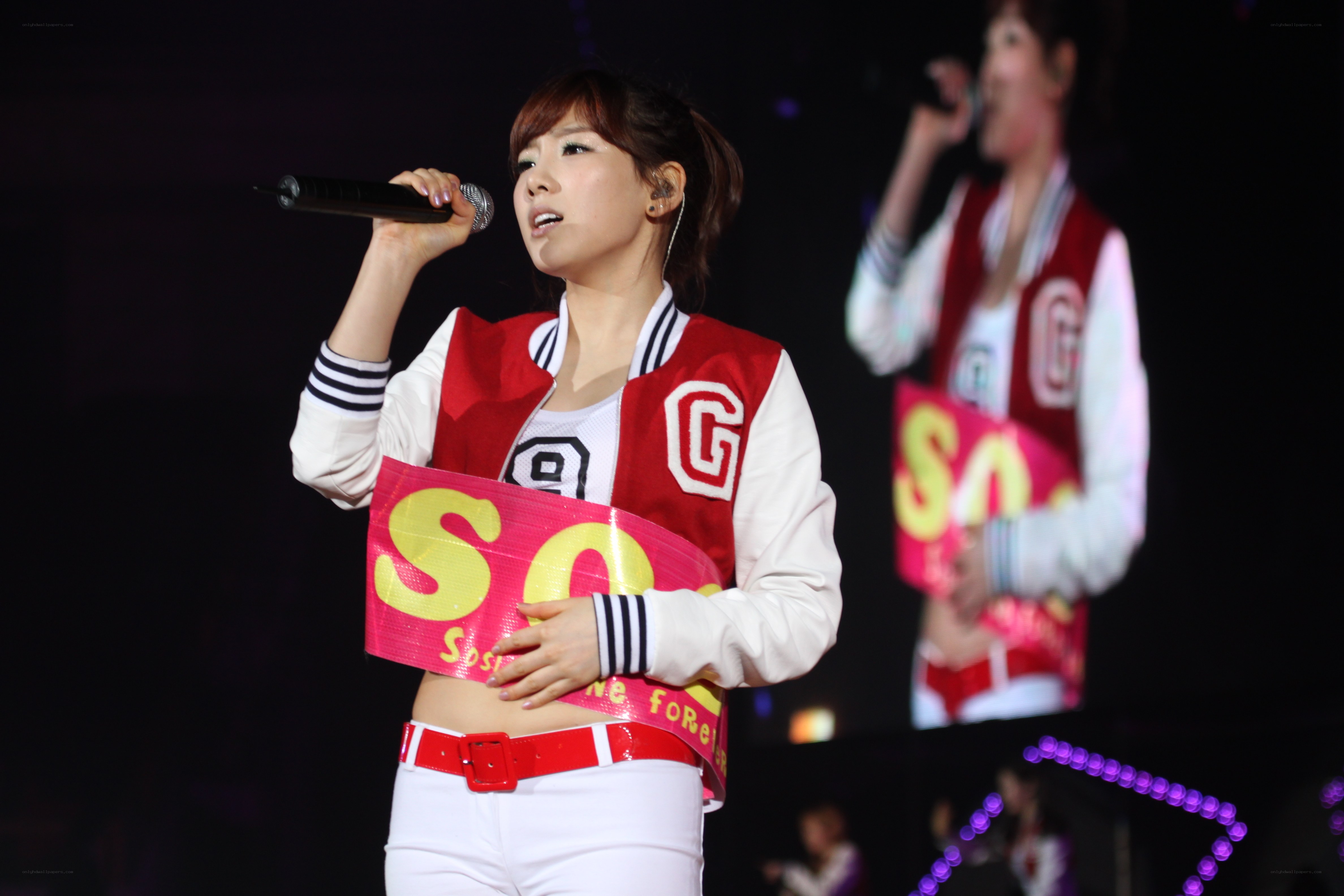 singer performing on stage