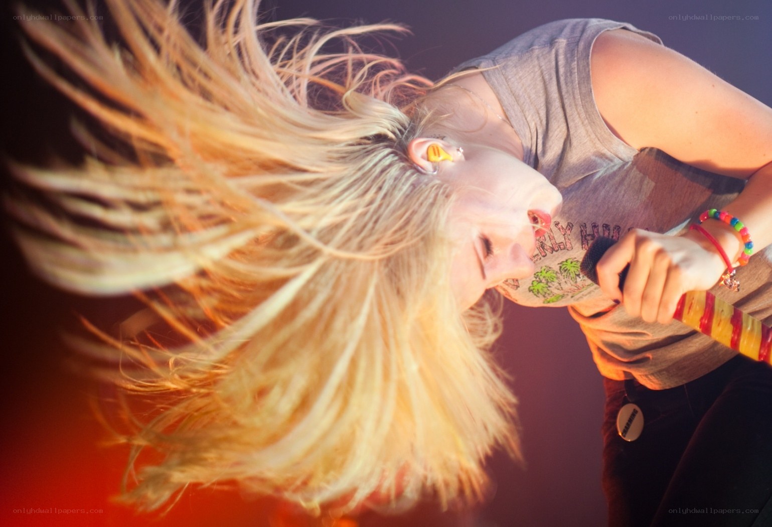 singer performing on stage