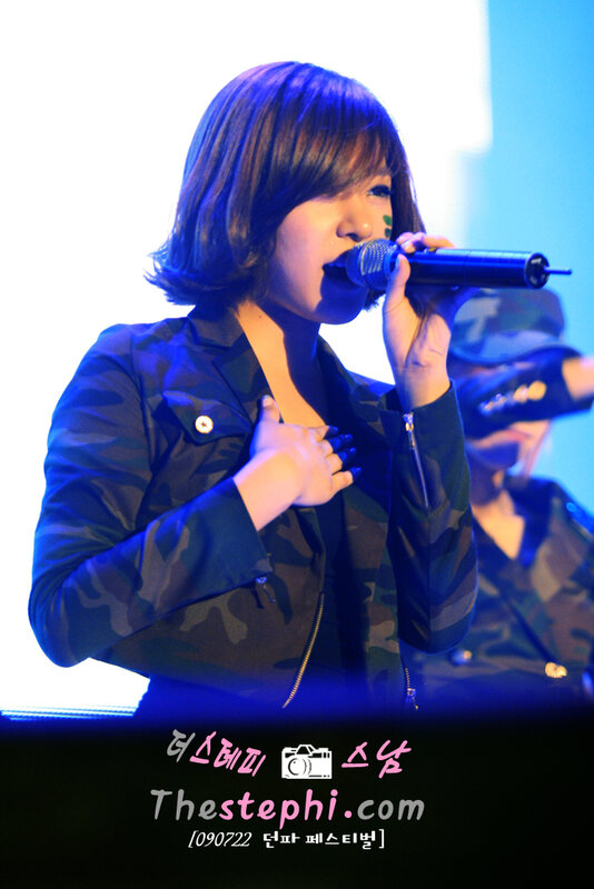 singer performing on stage