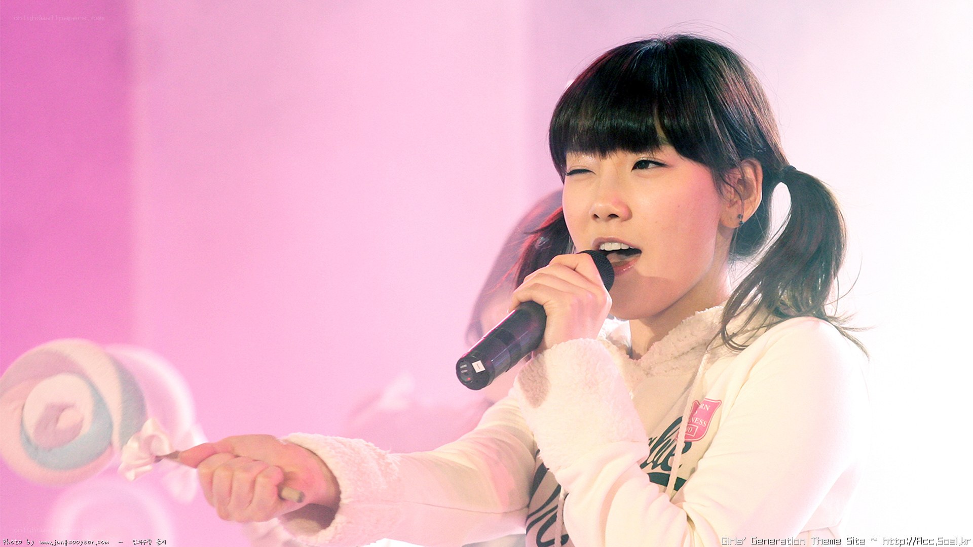 singer performing on stage