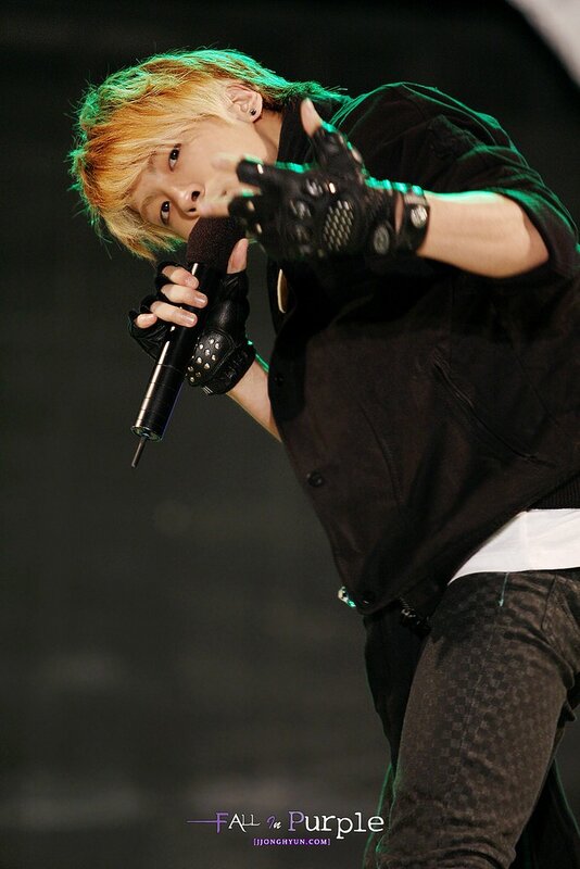 singer performing on stage
