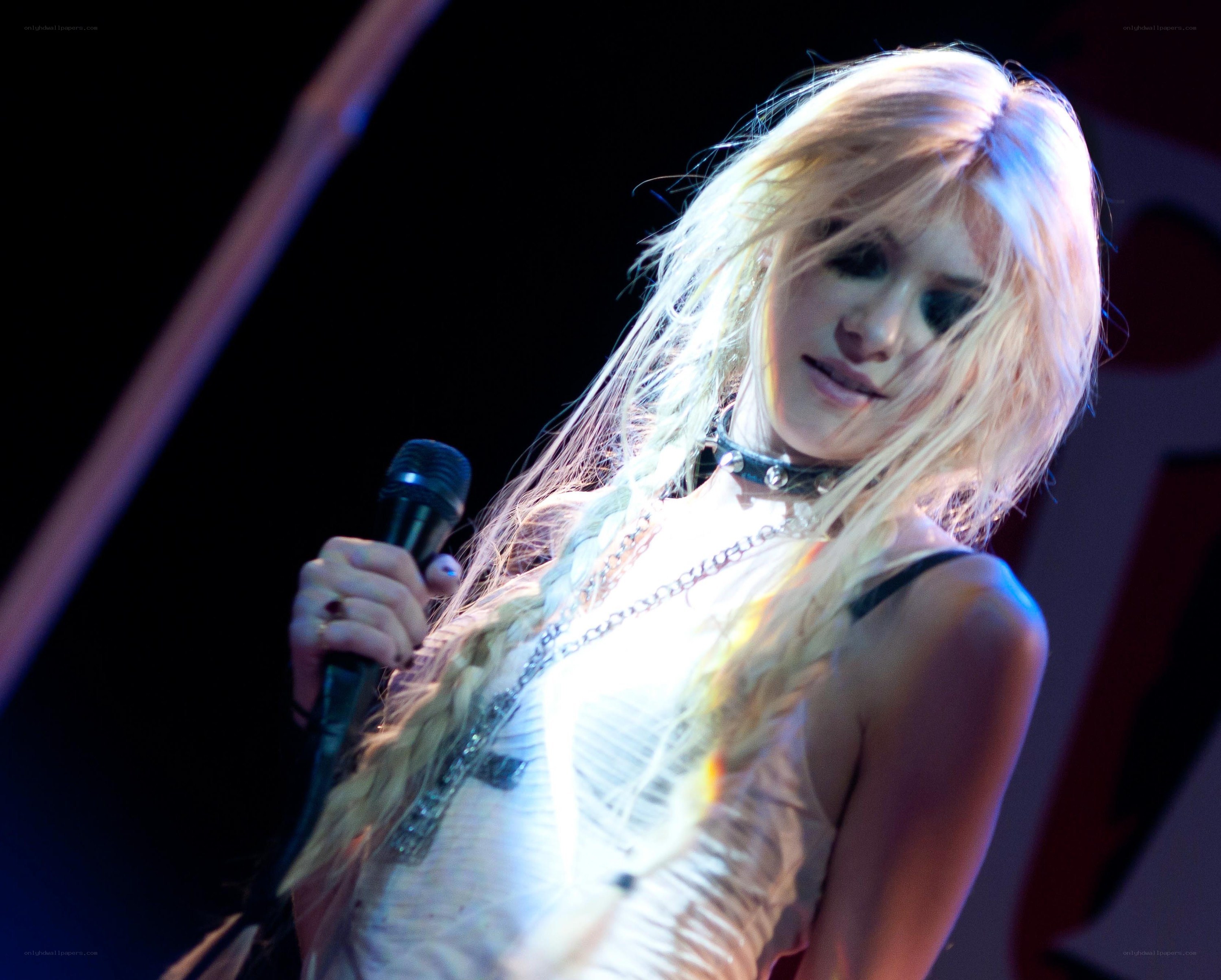 singer performing on stage