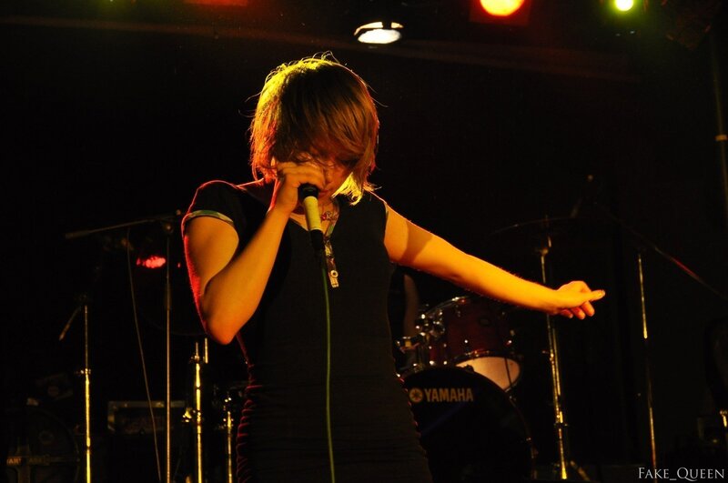 singer performing on stage