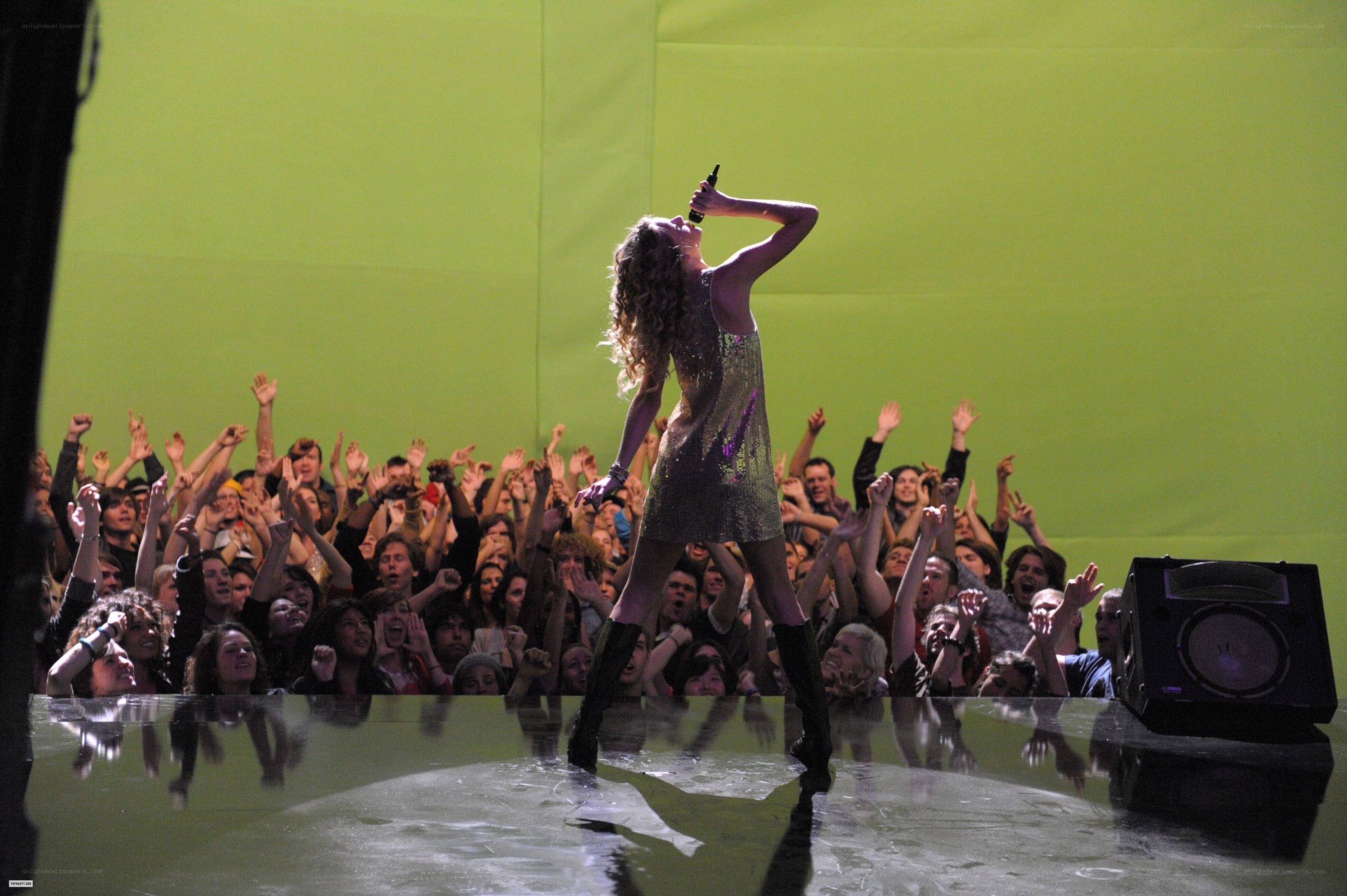 singer performing on stage
