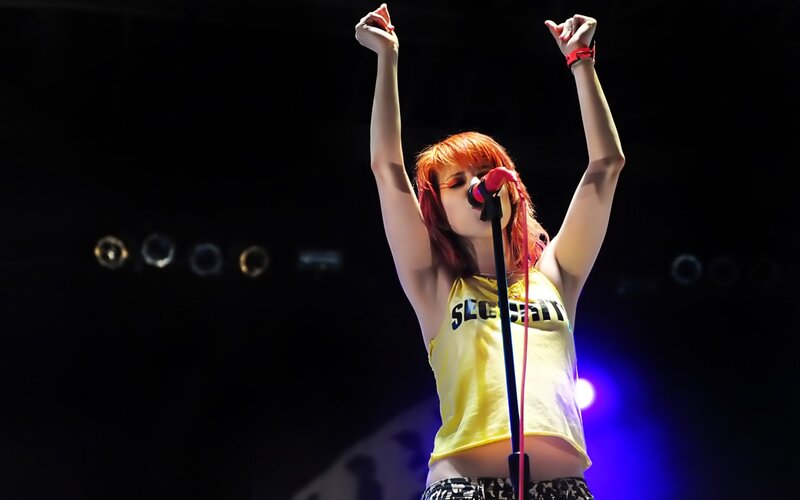 singer performing on stage