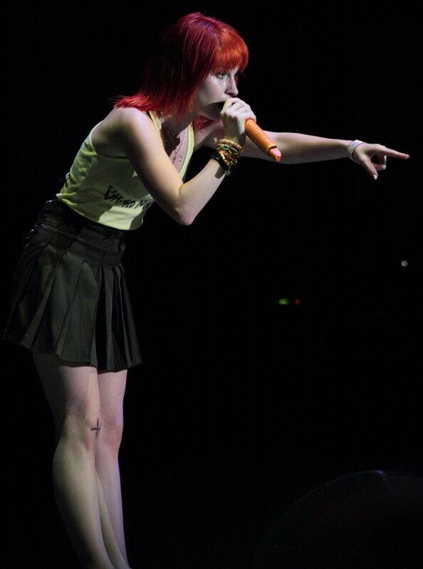 singer performing on stage