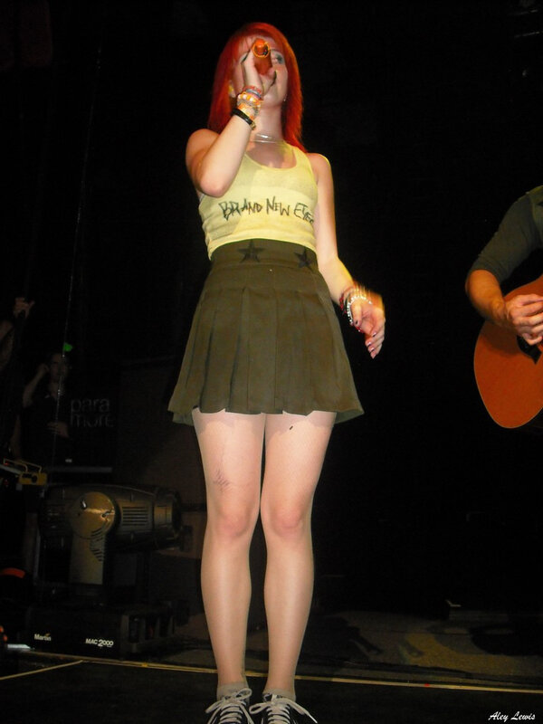 singer performing on stage