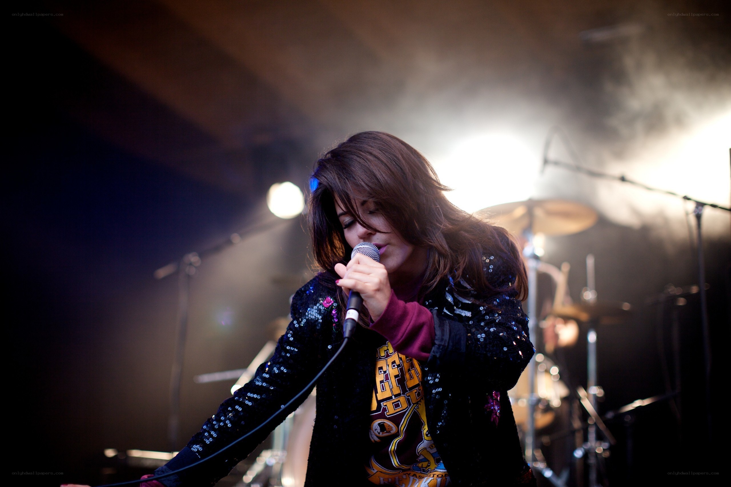 singer performing on stage