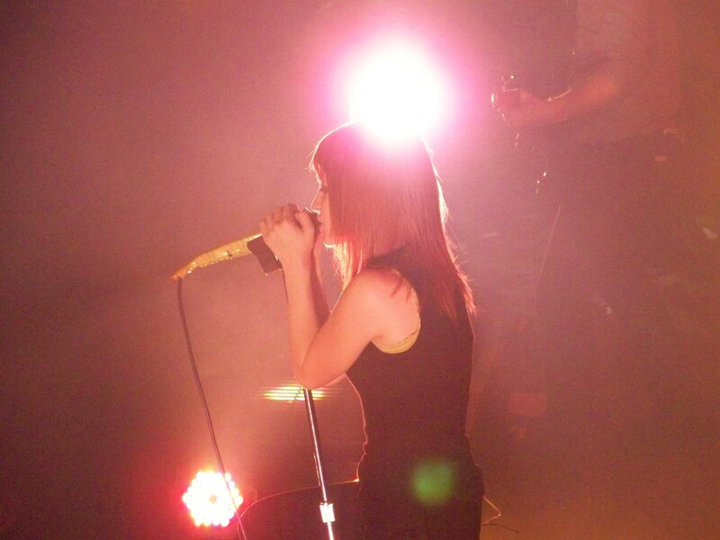 singer performing on stage