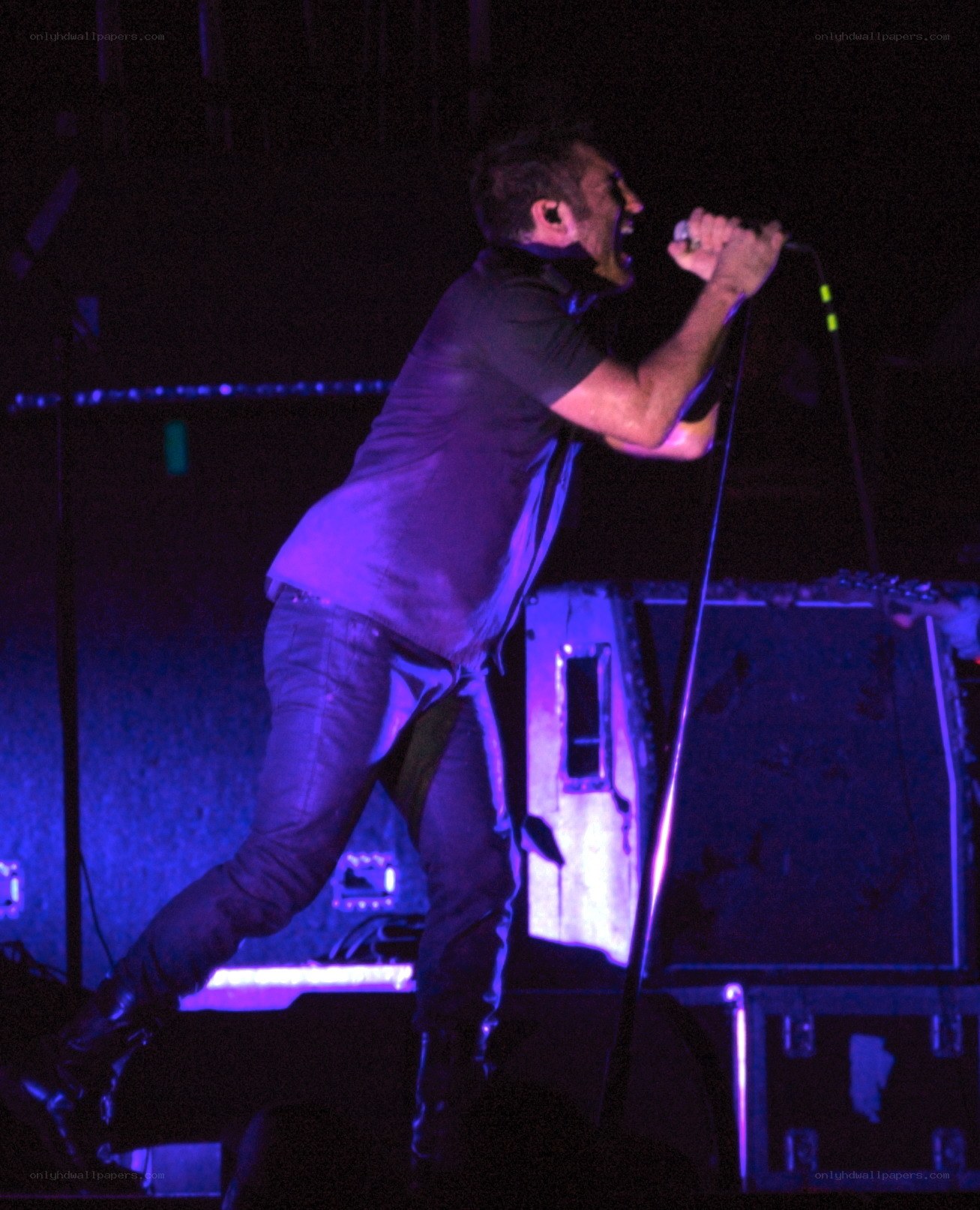 singer performing on stage