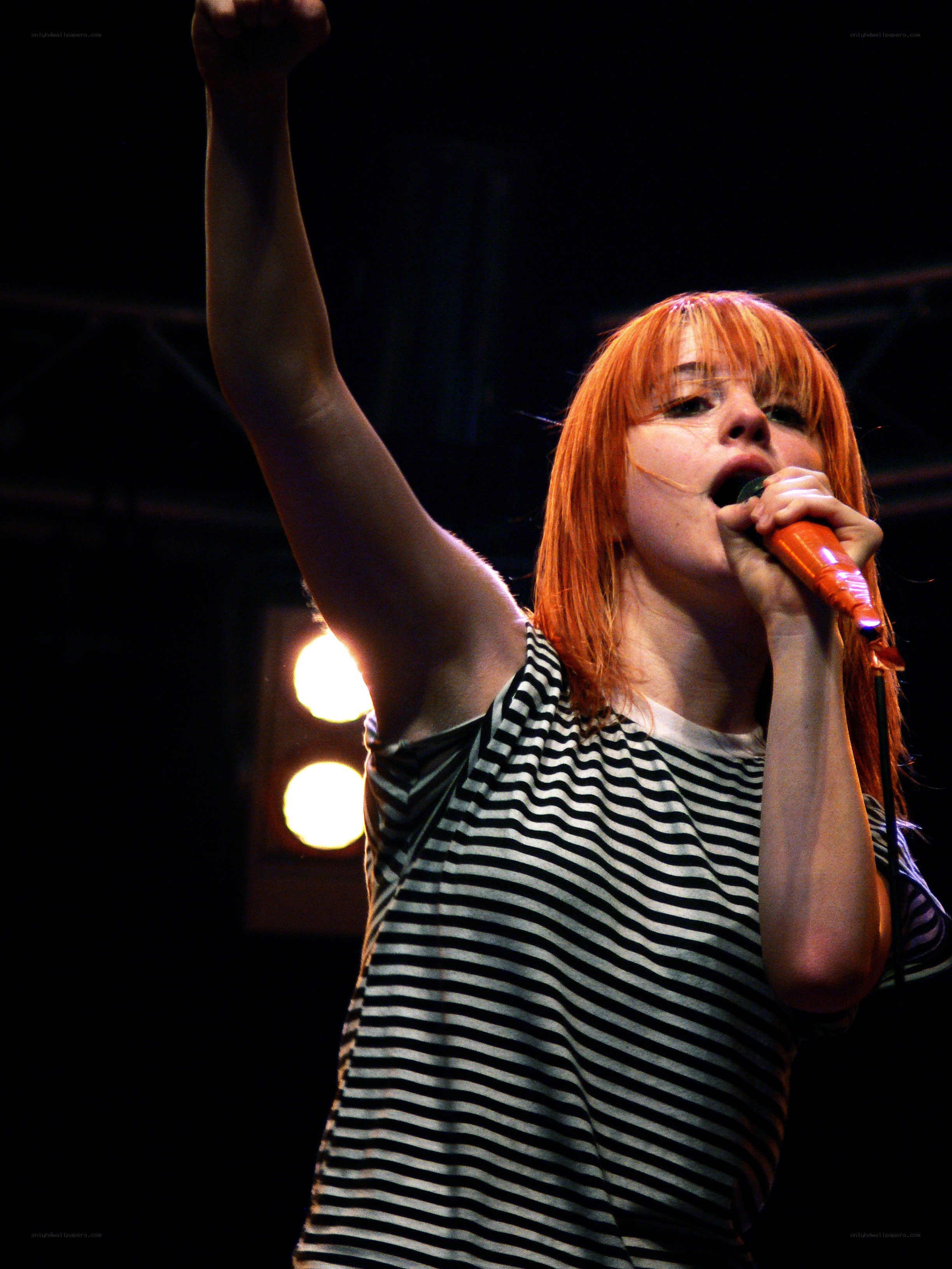 singer performing on stage