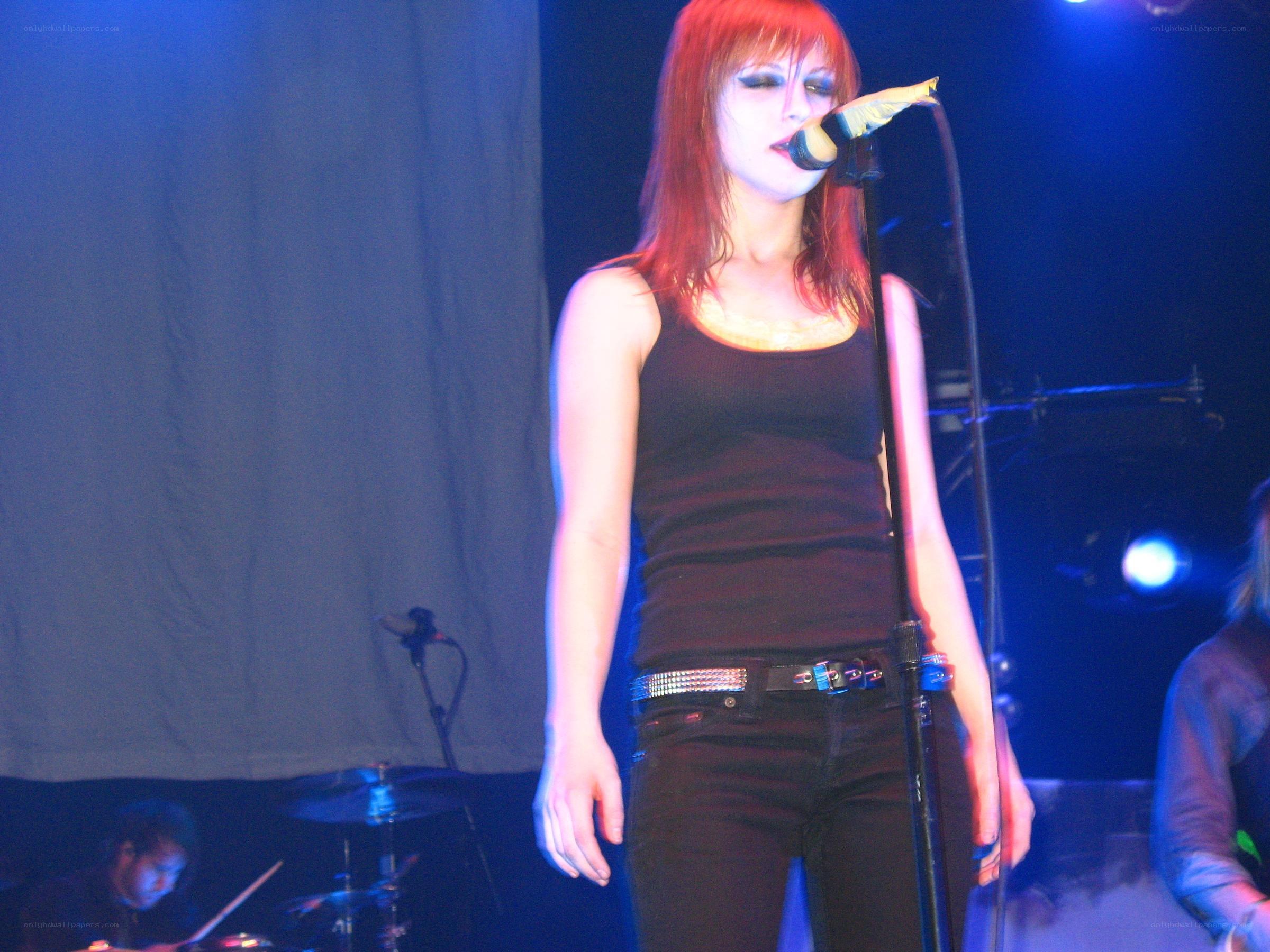 singer performing on stage