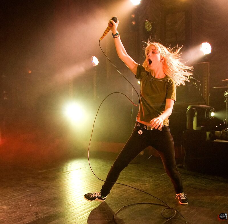 singer performing on stage