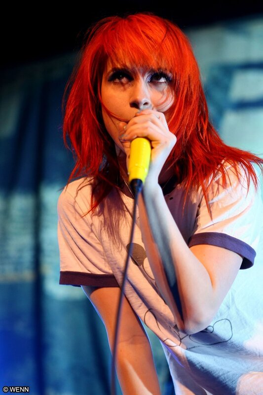 singer performing on stage