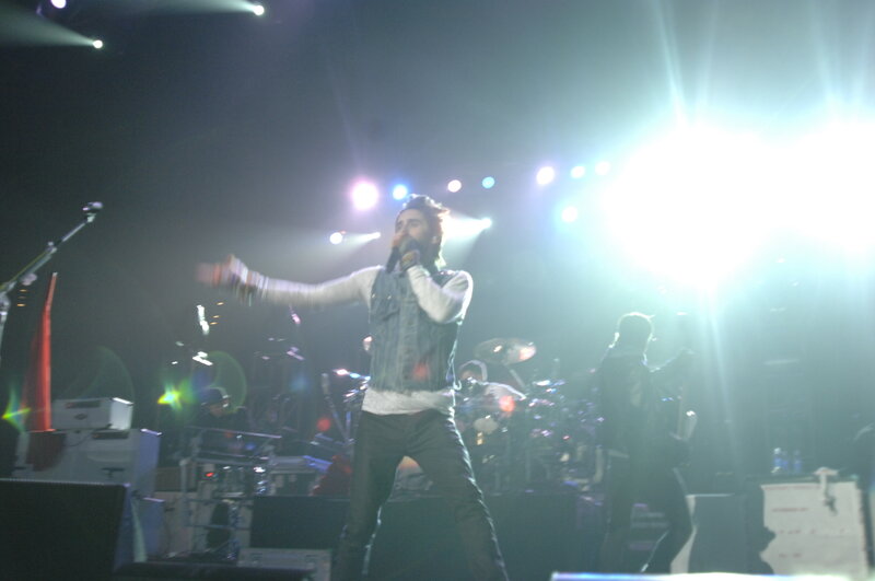 singer performing on stage