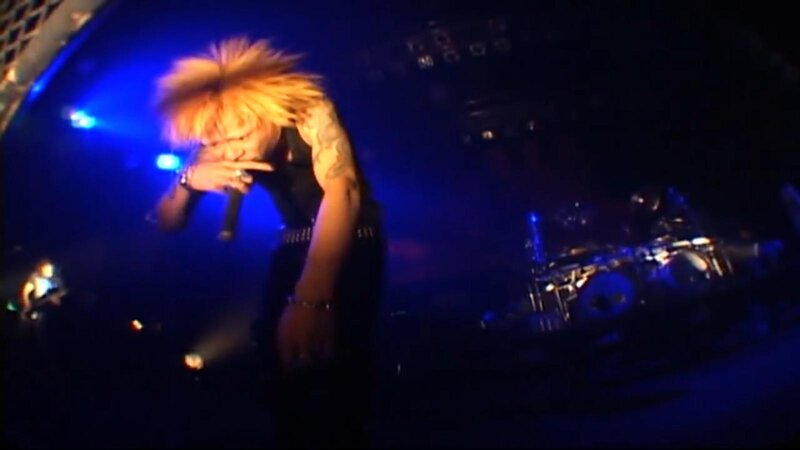 singer performing on stage