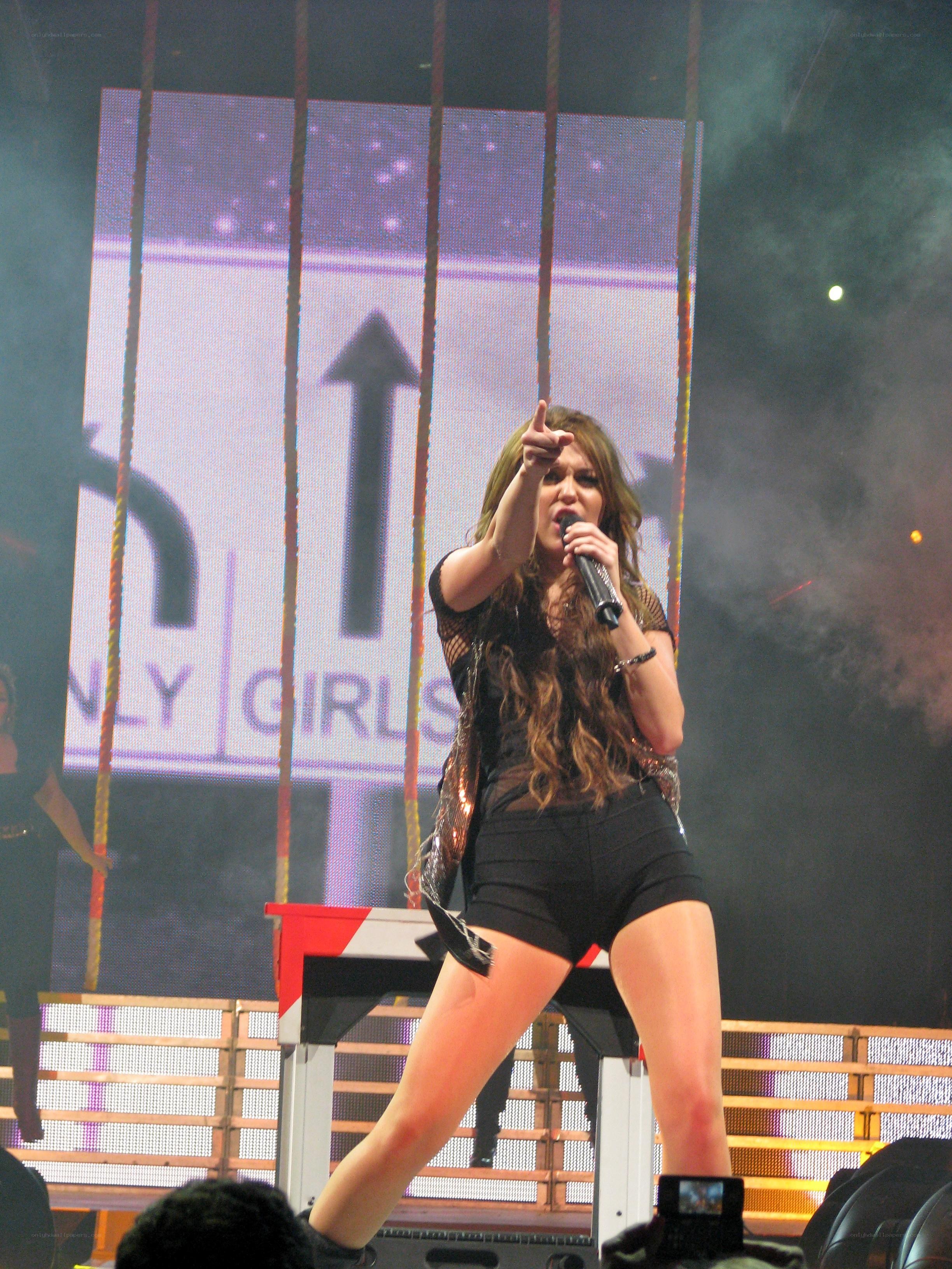singer performing on stage