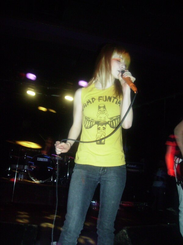 singer performing on stage