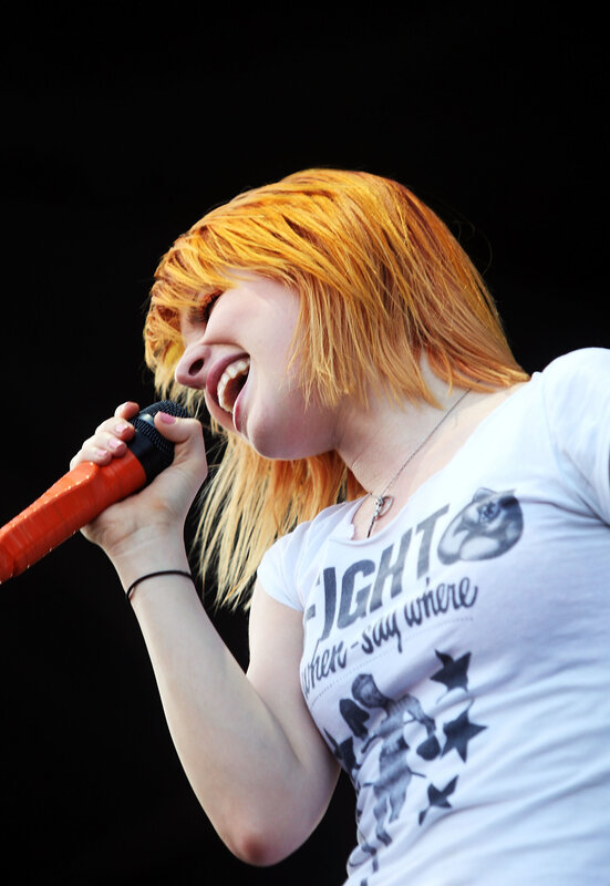 singer performing on stage