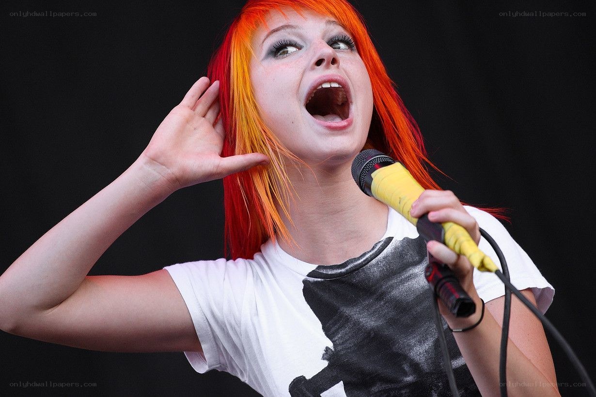 singer performing on stage