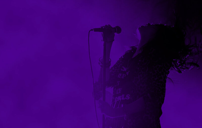 singer performing on stage