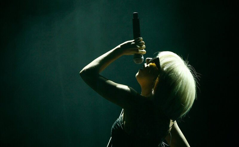 singer performing on stage
