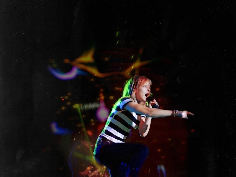 singer performing on stage