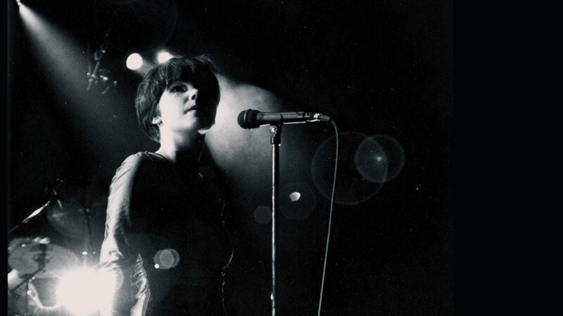 singer performing on stage