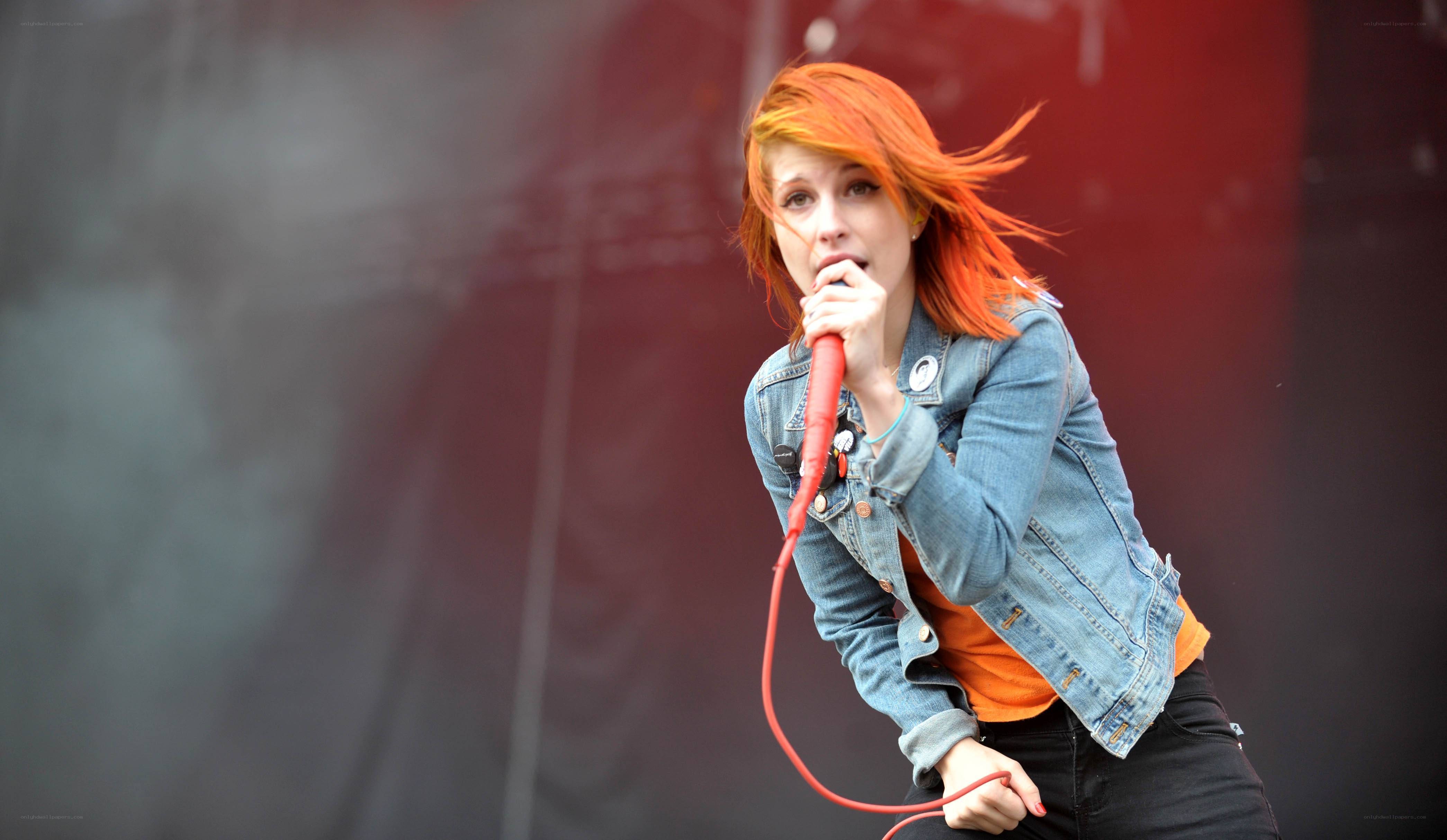 singer performing on stage