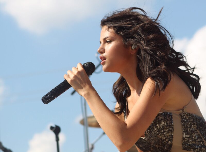 singer performing on stage