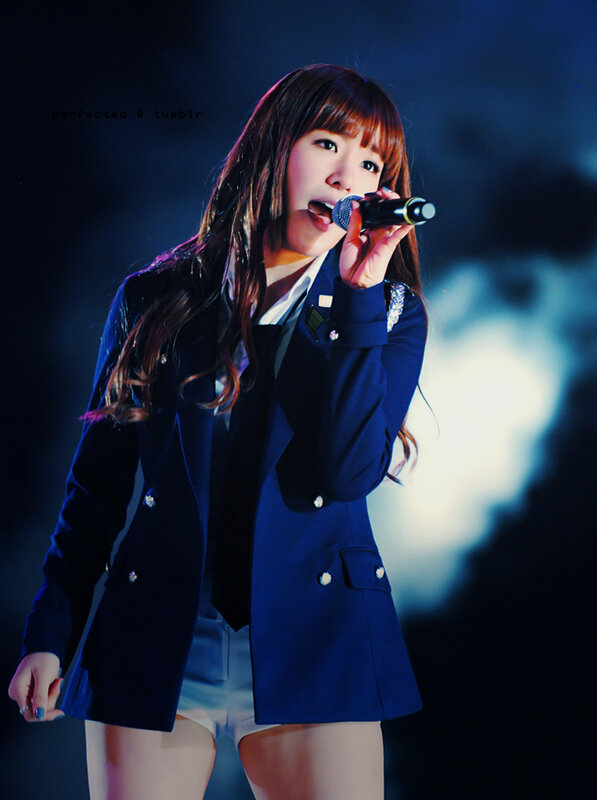 singer performing on stage