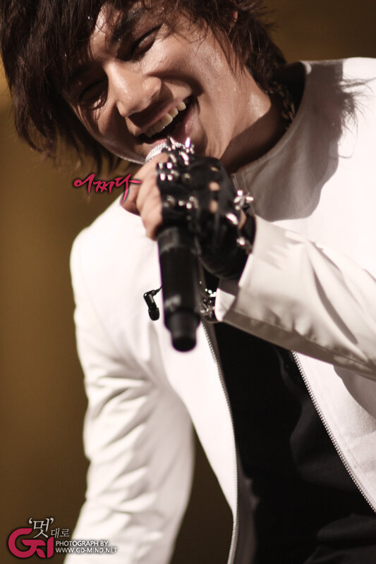 singer performing on stage