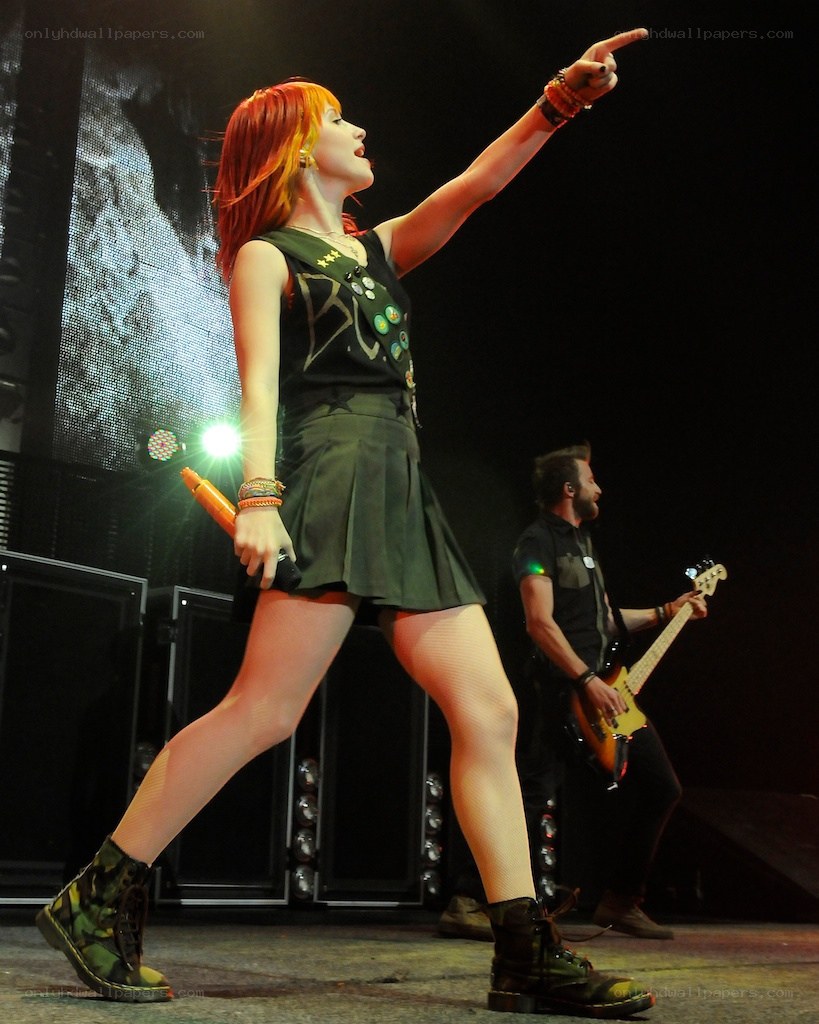 singer performing on stage